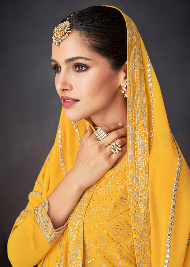 Shop Now Bright Yellow Georgette Embellished Festive Sharara Suit Online at Empress Clothing in USA, UK, Canada & Worldwide.