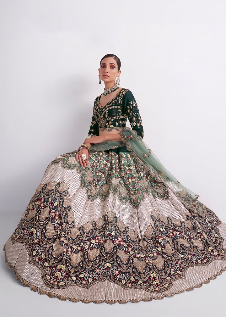 Buy Now Stunning Shaded Green Heavy Embroidered Bridal Lehenga Choli Online in USA, UK, Canada & Worldwide at Empress Clothing.