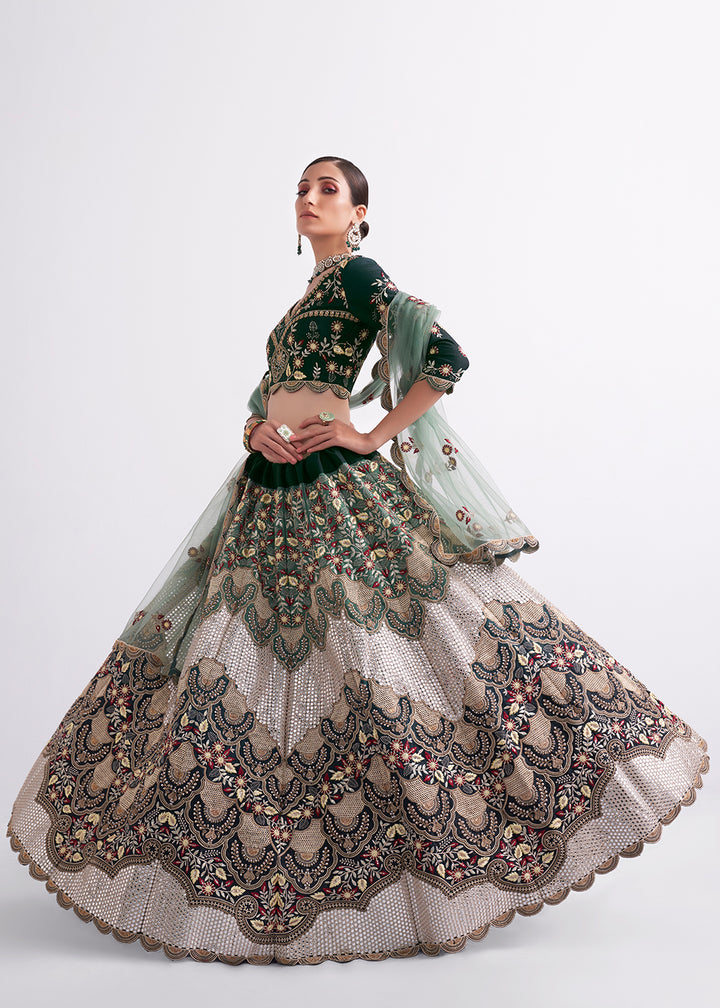 Buy Now Stunning Shaded Green Heavy Embroidered Bridal Lehenga Choli Online in USA, UK, Canada & Worldwide at Empress Clothing.