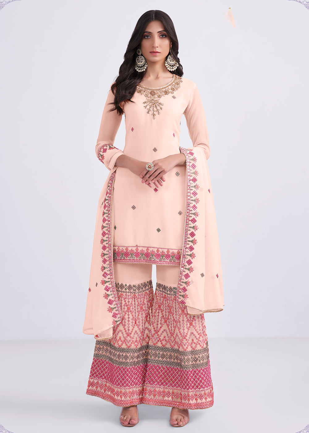 Shop Now Pretty Peach Sequins & Multi Thread Work Designer Sharara Suit Online at Empress Clothing in USA, UK, Canada, Germany & Worldwide. 