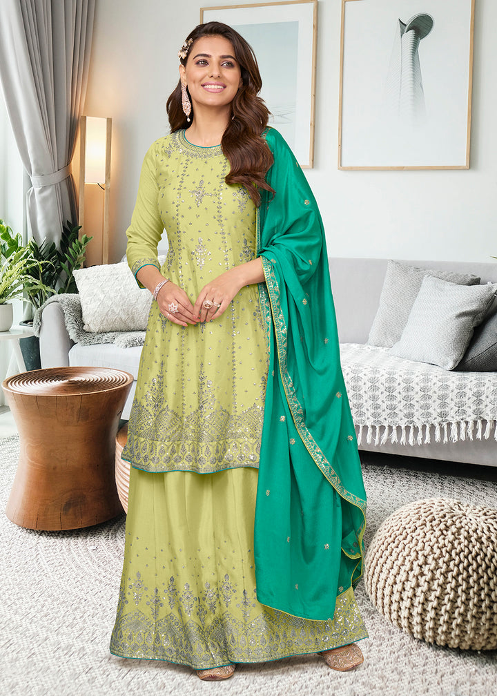 Buy Now Adorning Pista Green Heavy Chinon Embroidered Palazzo Kurta Set Online in USA, UK, Canada, Germany, Australia & Worldwide at Empress Clothing. 