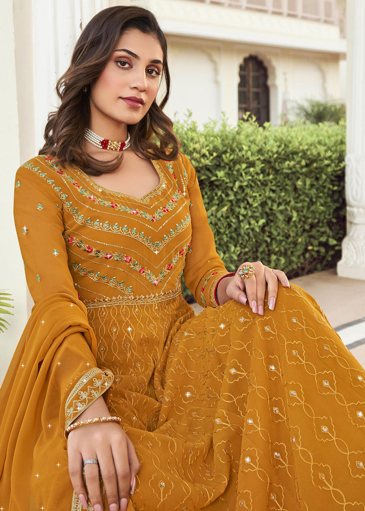 Buy Now Floor Length Tempting Mustard Wedding Wear Anarkali Suit Online in USA, UK, Australia, New Zealand, Canada, Italy & Worldwide at Empress Clothing. 