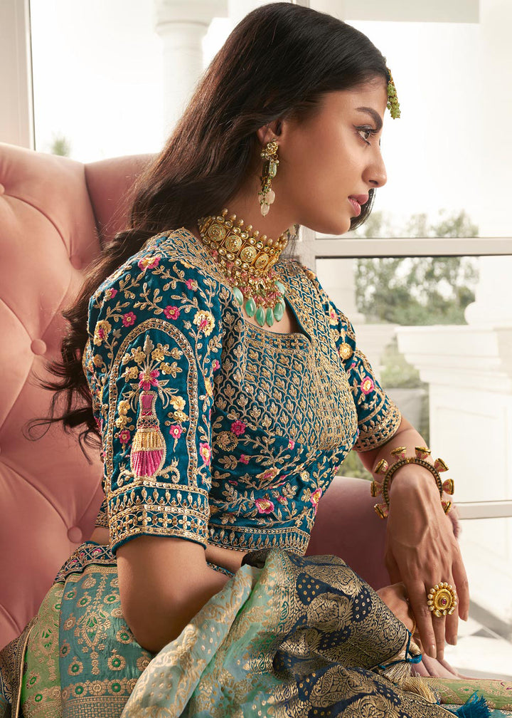 Buy Now Aqua Blue & Mint Green Heavy Embroidered Silk Bridal Lehenga Choli Online in USA, UK, Canada & Worldwide at Empress Clothing. 