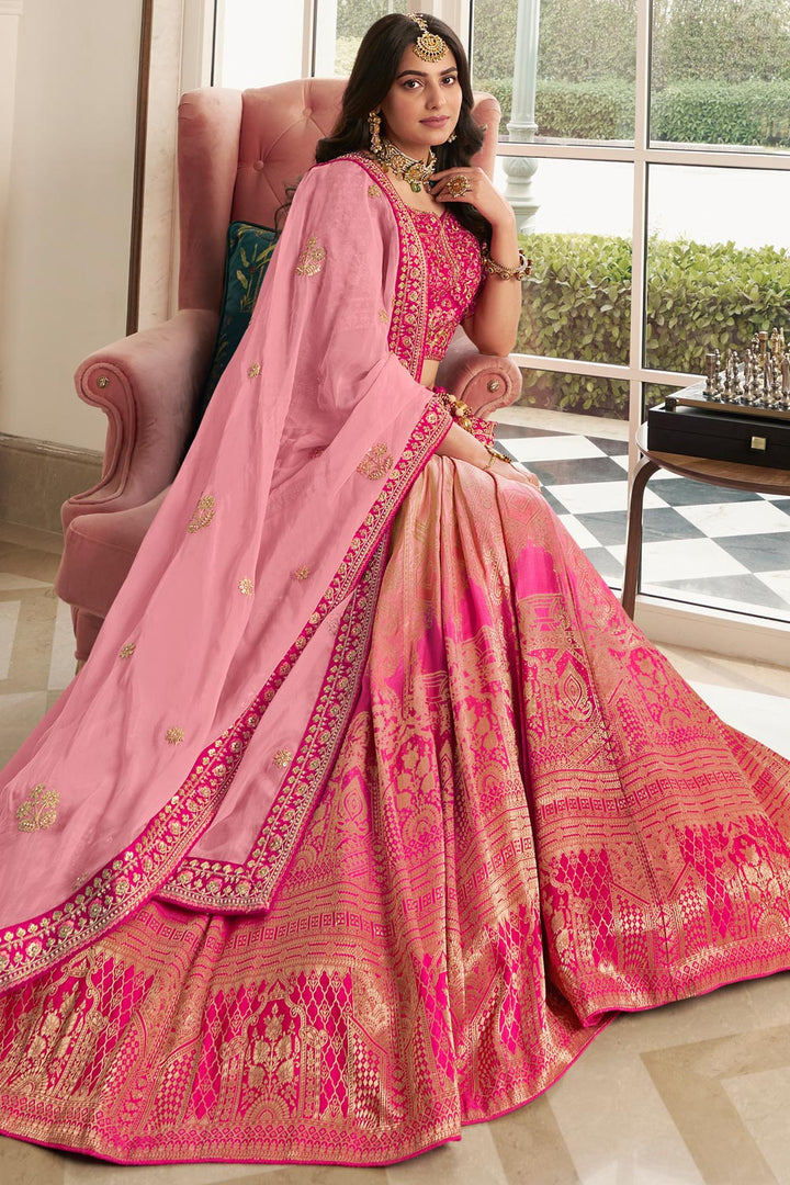 Buy Now Ombre Coral Pink Heavy Embroidered Silk Bridal Lehenga Choli Online in USA, UK, Canada & Worldwide at Empress Clothing. 