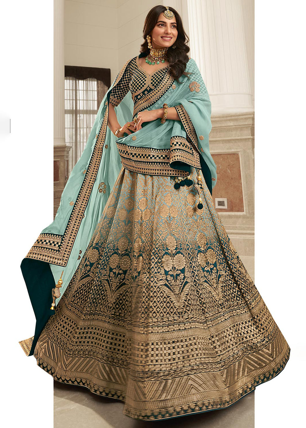 Buy Now Pretty Teal Blue Heavy Embroidered Silk Bridal Lehenga Choli Online in USA, UK, Canada & Worldwide at Empress Clothing. 