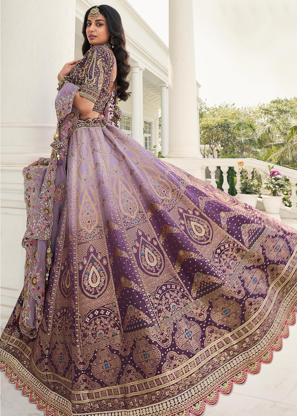 Buy Now Beauteous Lavender Heavy Embroidered Silk Bridal Lehenga Choli Online in USA, UK, Canada & Worldwide at Empress Clothing. 