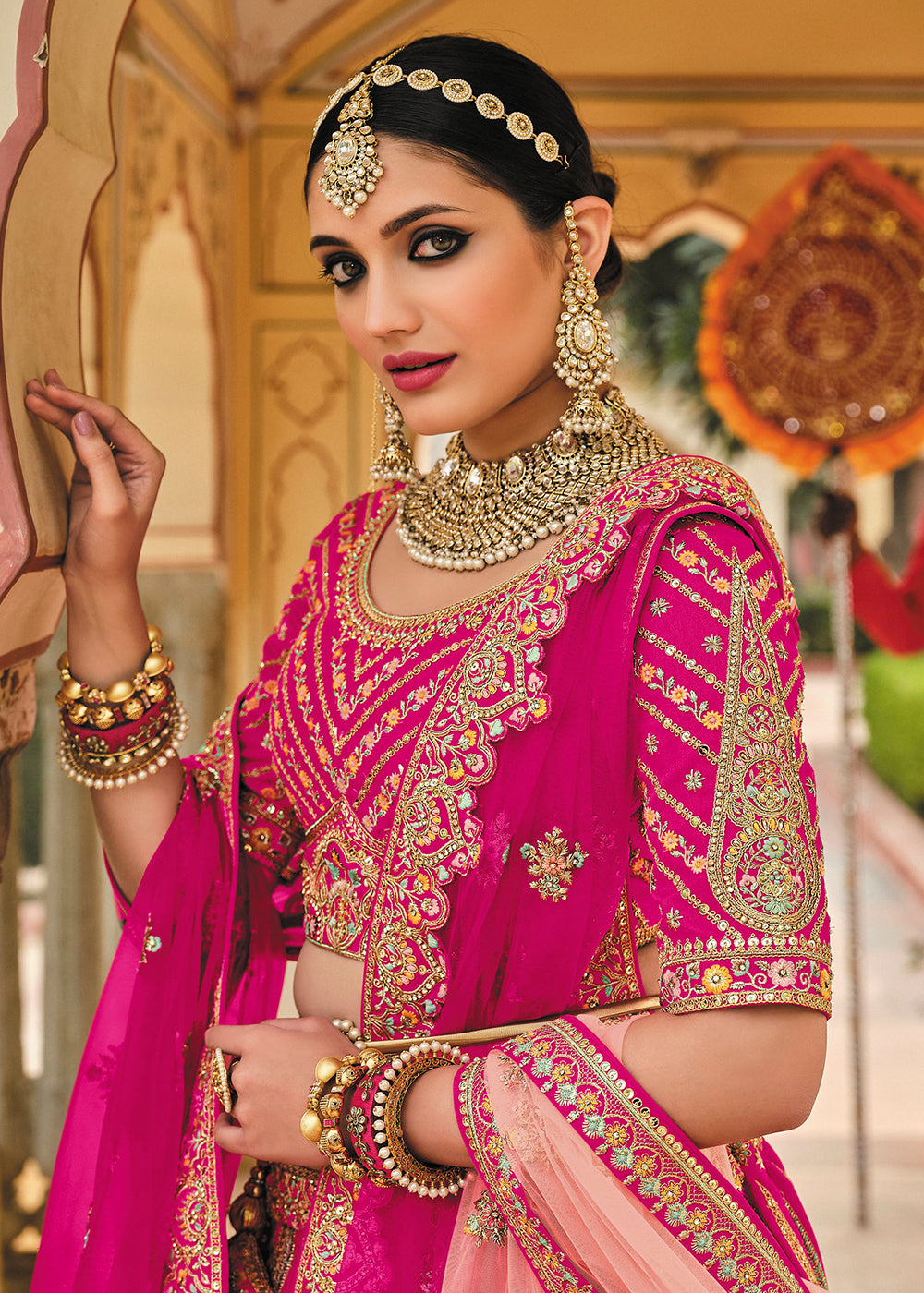 Buy Now Enticing Pink Bridal Wear Heavy Embroidered Silk Lehenga Choli Online in USA, UK, Canada & Worldwide at Empress Clothing.