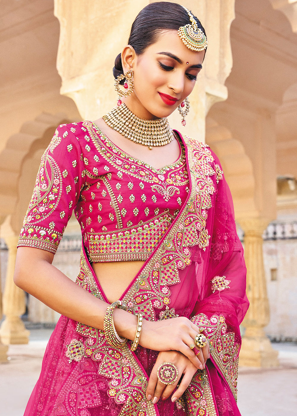 Buy Now Magenta Pink Bridal Wear Heavy Embroidered Silk Lehenga Choli Online in USA, UK, Canada & Worldwide at Empress Clothing.