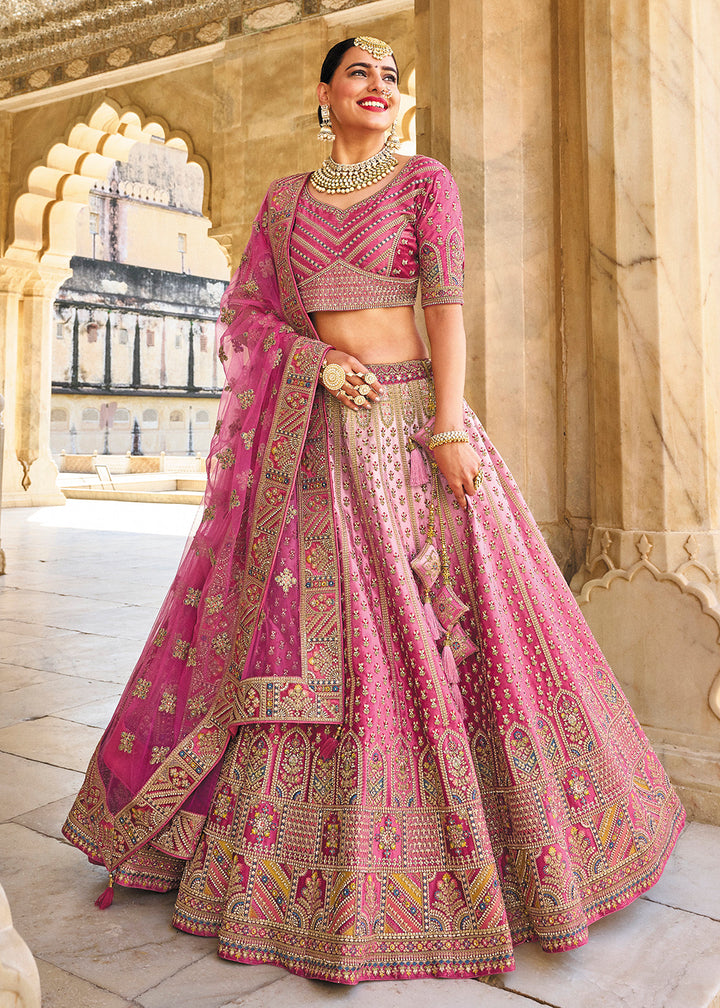 Buy Now Wonderous Pink Bridal Wear Heavy Embroidered Silk Lehenga Choli Online in USA, UK, Canada & Worldwide at Empress Clothing.