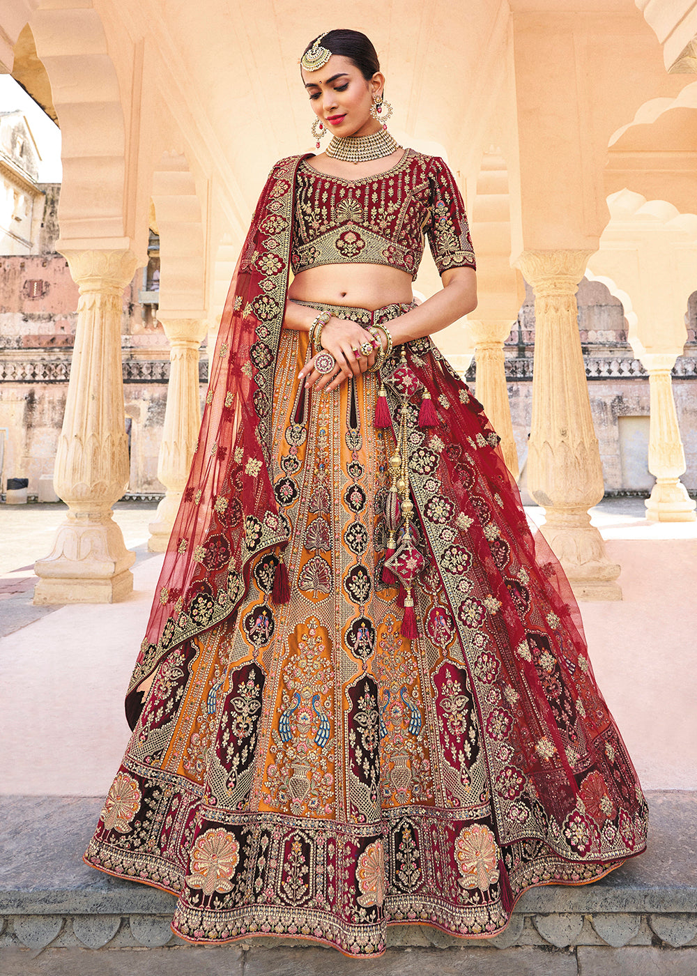 Buy Now Yellow & Maroon Bridal Wear Heavy Embroidered Silk Lehenga Choli Online in USA, UK, Canada & Worldwide at Empress Clothing.