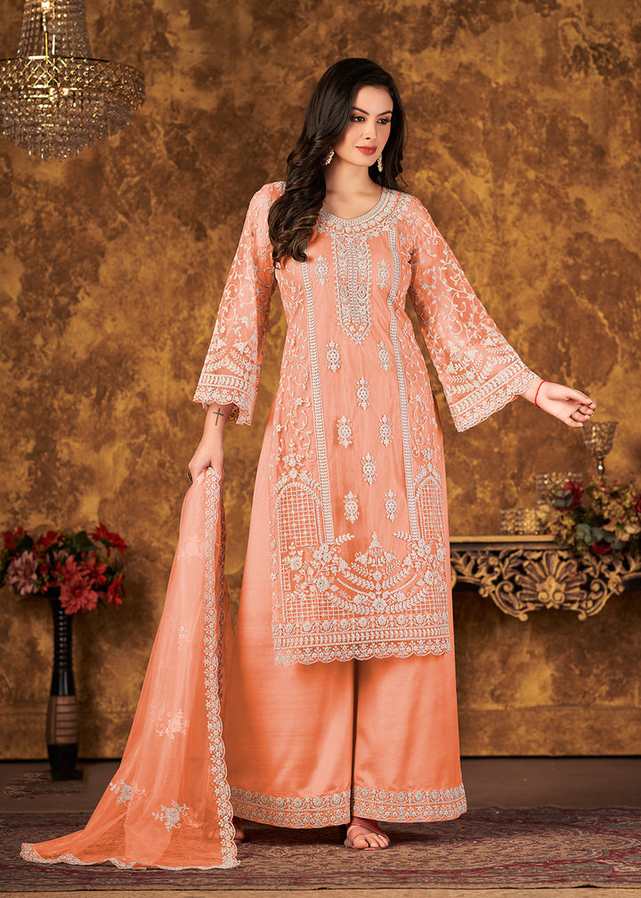 Buy Now Elegant Peach Cording Embroidered Net Palazzo Salwar Suit Online in USA, UK, Canada & Worldwide at Empress Clothing.