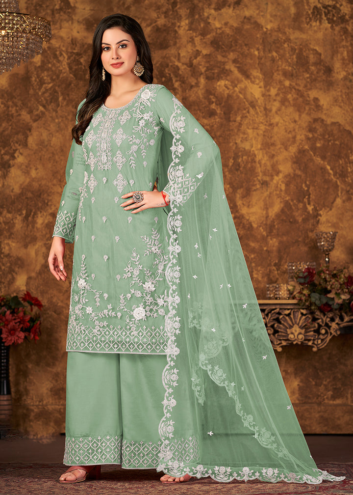 Buy Now Lovely Sea Green Cording Embroidered Net Palazzo Salwar Suit Online in USA, UK, Canada & Worldwide at Empress Clothing.
