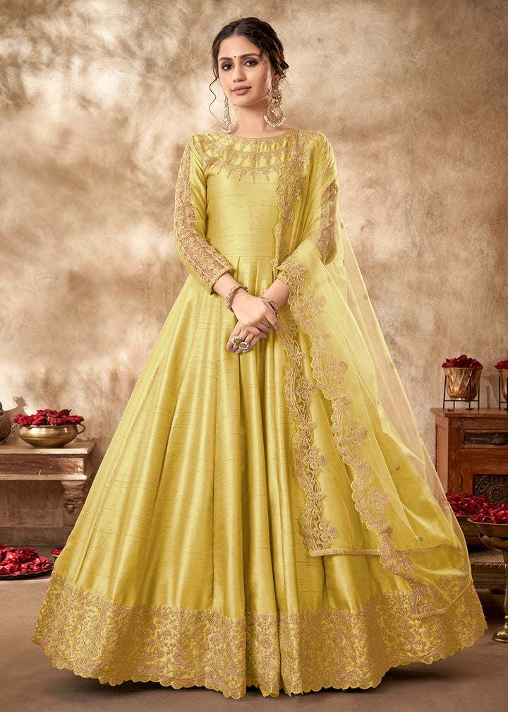 Buy Now Engaging Yellow Art Silk Zari Embroidered Festive Anarkali Gown Online in UK at Empress Clothing.