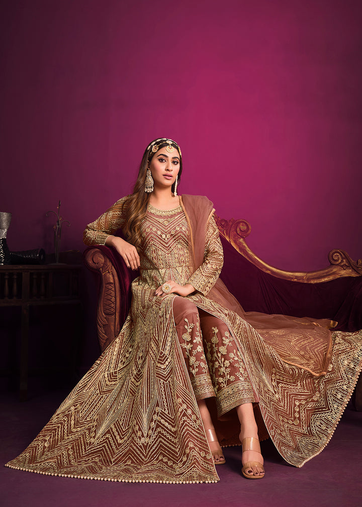 Buy Now Net Brownish Peach Floor Length Sangeet Wear Anarkali Suit Online in USA, UK, Australia, New Zealand, Canada, Italy & Worldwide at Empress Clothing. 